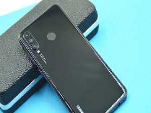 经验分享华为nova4e中隐藏刘海的操作方法。